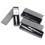 Four Pierre Belvedere ballpoint writing pens, one of cream design boxed, the other of gold