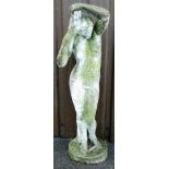 A reconstituted stone figure of a nude lady, on a circular base, 120cm high, 22cm wide.