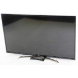 A JVC 49 inch flat screen television, model LT-49C770(A), with power lead and remote.
