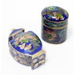 Two oriental cloisonné trinket boxes, the oval example with blue enamel cloisonné decoration on