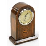 An Edwardian mahogany mantel clock, in a mahogany case with marquetry shell banding with a German