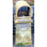 A Victorian stoneware chimney pot, with domed open hood top, on a square taper base, 88cm high.