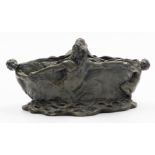 An Art Nouveau style bronze bowl, depicting group of figures intertwined, 32cm wide, on a