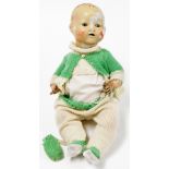 A German bisque headed doll, the head stamped BND London no.5, on a plastic body, full clothing,