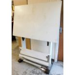 A large white artist's board, 160cm high, 120cm wide, base approx 36cm deep.