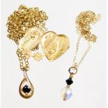 A small group of jewellery, to include a pendant and chain, the four plated pendant on a 9ct gold