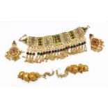 Eastern dress jewellery, to include a brass multi row set choker, with rectangular panels and drop
