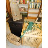 A group of furnishings, to include a storage basket, a wicker basket, a wooden wine rack, two