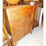 *A group of furniture, to include an Art Deco style oak side cabinet, with single drawer top on