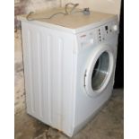 A Bosch Classixx 1200 Express washing machine, in white.