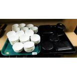 A set of finger bowls, and various modern black lacquered trays and storage jars. (2 trays)