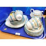A Crown Staffordshire part tea service, with blue design borders, and floral trims, comprising