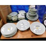 A Johnson Brothers Greendawn part service, comprising meat plates, dinner plates, soup bowls, side