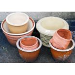 A group of various stone terracotta and other planters, wall mounted planters, etc. (8)