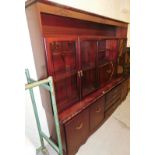 *A 20thC wall unit, of large proportions, with double panel glazed display cabinet doors, open bar
