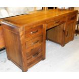 *A modern hardwood office desk, the shaped design top with three drawer section to left on metal