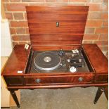 A Dynatron SRX80 record player, in a mahogany finish cabinet, the central lift up section with