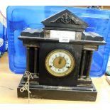 *A late 19thC black slate mantel clock, with column supports and marble inlay columns, eight day