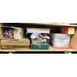 A quantity of Christmas decorations, bows, baubles, pine cones, tinsel, etc. (1 shelf)