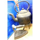 An iron kettle, stamped Didums, and a kettle on trivet. (3)