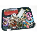 Various costume jewellery and effects, to include silver plated locket, necklaces, glass Jesus