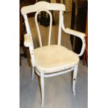 A white painted bentwood chair.