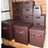 A large group of faux leather storage trays and boxes, to include a graduated set of three storage