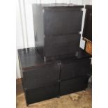 Three two drawer bedside cabinets, each in a black finish, 55cm high, 40cm wide, 48cm deep.