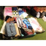 A quantity of ladies and gentleman's clothing, handbags, vanity cases, linen, etc. (5 boxes)