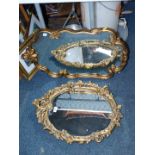 Two gilt plaster rococo style wall mirrors.