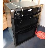 A New World integrated oven with gas grill and electric oven.