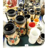 A collection of Bretby and Cyples vases, to include two handled examples, depicting oriental scenes,