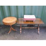 A reproduction mahogany drum table, with leather inset, 55cm high, 51cm diameter, a coffee table,