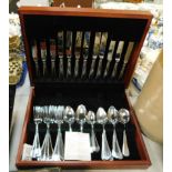 A Marks & Spencer's stainless steel canteen of cutlery, in a hardwood case.