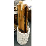 A folding artist's easel, walking sticks, umbrella stand, etc. (a quantity)