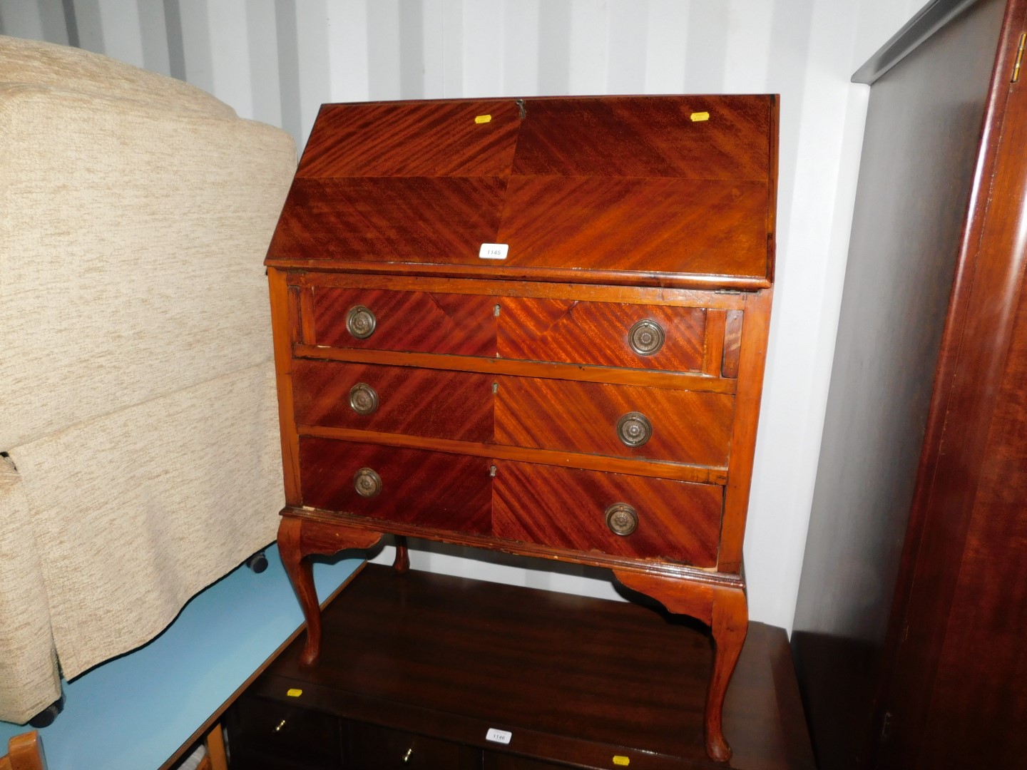 A 20thC mahogany bureau, with fitted interior raised on cabriole legs, 100cm high, 78cm wide, 41cm