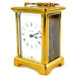 A modern French brass carriage clock, the dial stamped Bayard, with a loop handle, 15cm high