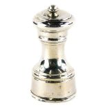 A silver pepper grinder, London assay, marks indistinct, 4¼oz all in, 9cm high.