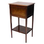 A mahogany work table, the rectangular top with a moulded edge enclosing a fabric lined interior, on