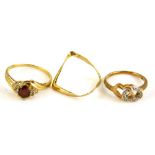 Three 9ct gold rings, to include a 9ct gold wishbone type ring, a 9ct gold two love heart ring set