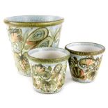 Three Denby Glyn College designed jardinieres, each with a design of leaves and scrolls etc.,