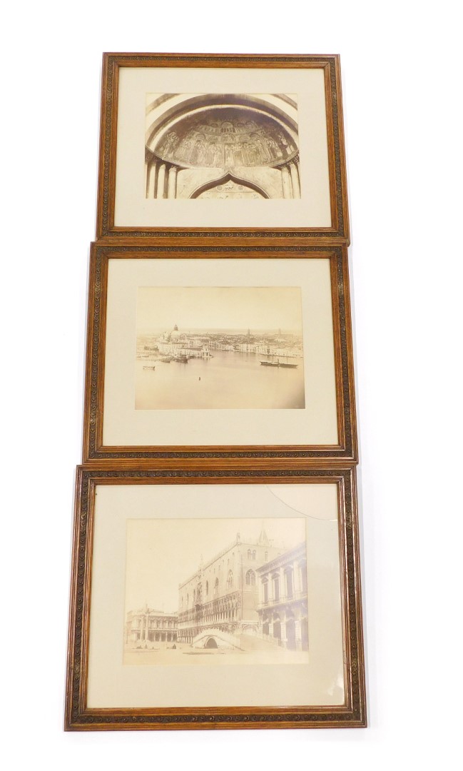 A black and white photograph, 26cm x 34cm, and two other photographs depicting a church interior,