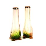 A pair of early 20thC Art Nouveau style pink and green glass vases, each with a silver collar, on