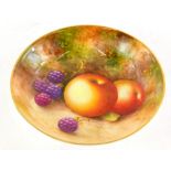 A Royal Worcester porcelain pin tray, painted with fruit, signed Roberts, printed mark in black to