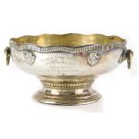A George V small silver presentation bowl or punch bowl, with a gadrooned shaped edge, two