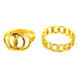Two dress rings, to include a knot weave ring, ring size R, stamped Italy, and a further chain