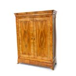 A 19thC German walnut and marquetry wardrobe, the moulded cornice bearing name Rosa Widman above two