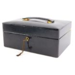 A brown leather Asprey London jewellery box, the box with key lock, metal hinges, single shelf