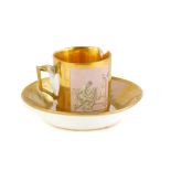 A continental porcelain coffee can and saucer, decorated with Grecian style figures within