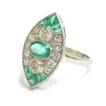 An Art Deco style emerald and diamond marcasite shaped ring, set with oval cut emerald and